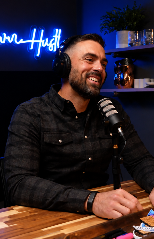 Daniel Bifano at the mic in the Hometown Hustle studio